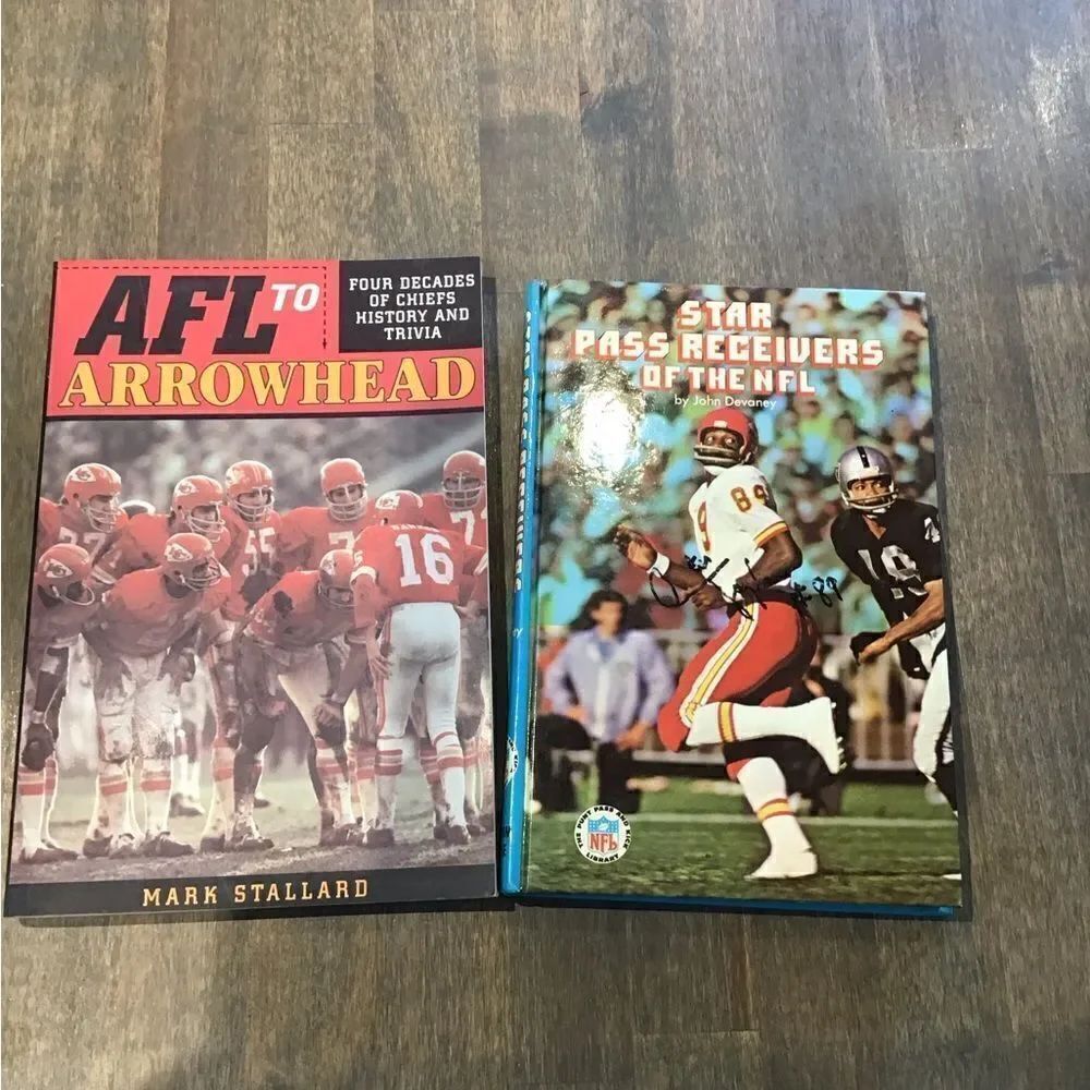 Two Kansas City Chiefs books, one autographed by Otis Taylor receiver, number 89
